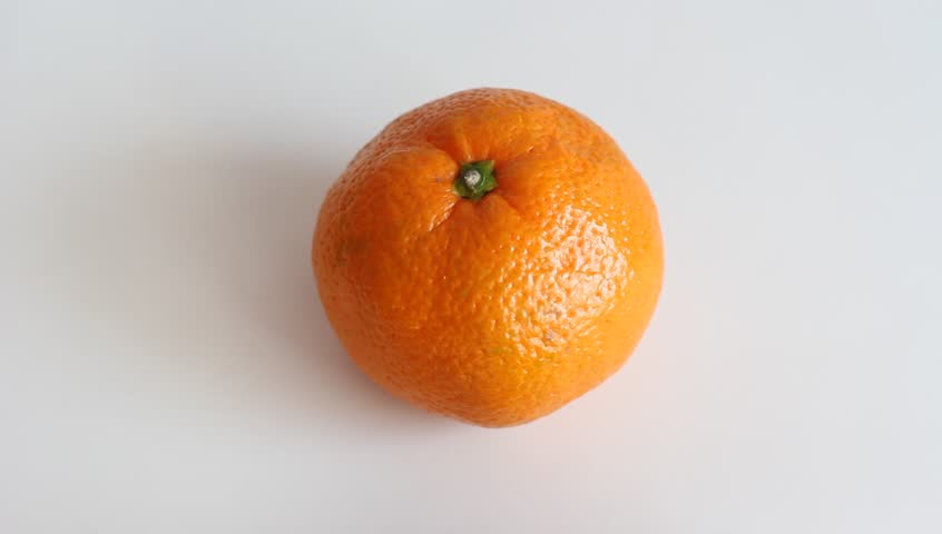 Peeling a tangerine