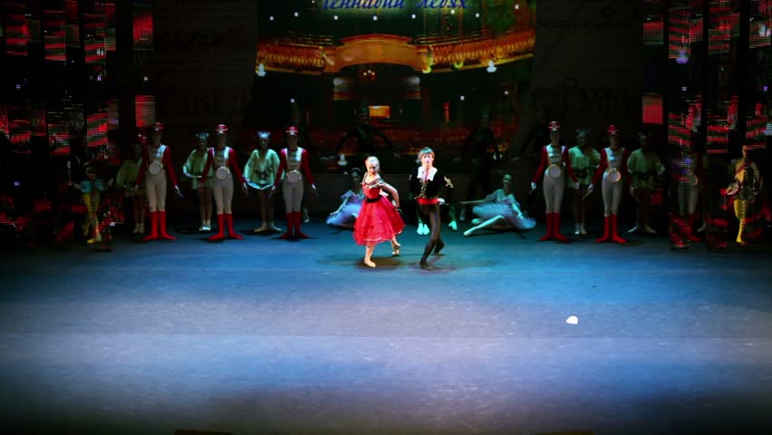 MOSCOW - MARCH 17: Boy and girl dance on scene on concert of First International Olympiad of Russian language for foreign kids at A. Kalyagin theater EtCetera, on March 17, 2011 in Moscow, Russia