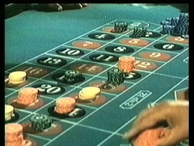 Clearing chips off roulette table