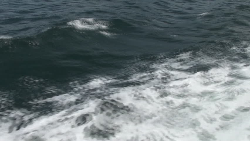 White foamed wash trailing from a motorboat
