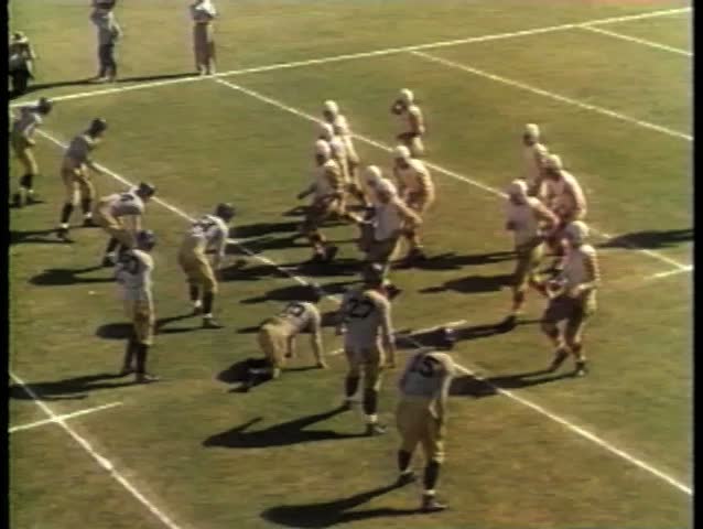 Wide shot of college football game