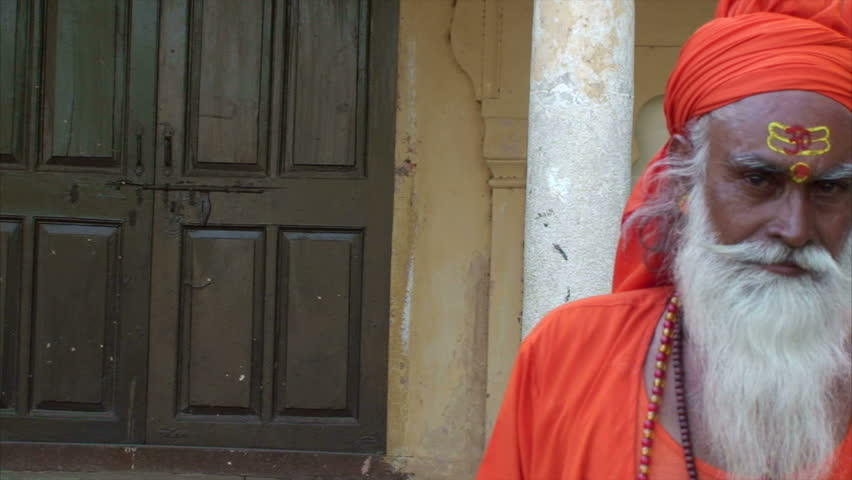 JAIPUR, RAJASTHAN, INDIA - MAY 14: Indian Sadhu or holy man raising his arm in blessing in Jaipur, India on May 14, 2011. There are 45 million sadhus in India today and they are widely respected for their holiness.