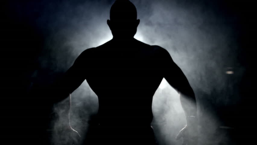 Bodybuilder posing back