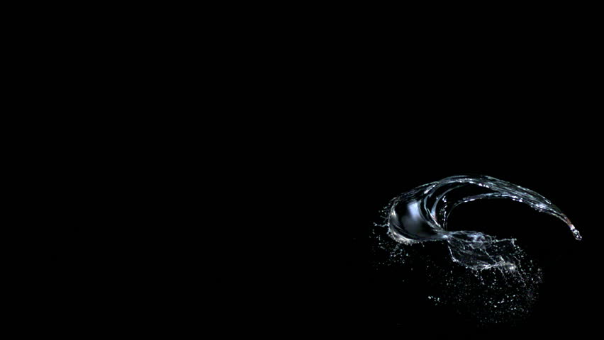 Water splash against black drop