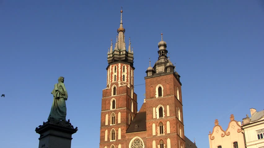 Mickiewicz Monument and Saint Mary's Basilica at Main Square, Krakow, Poland