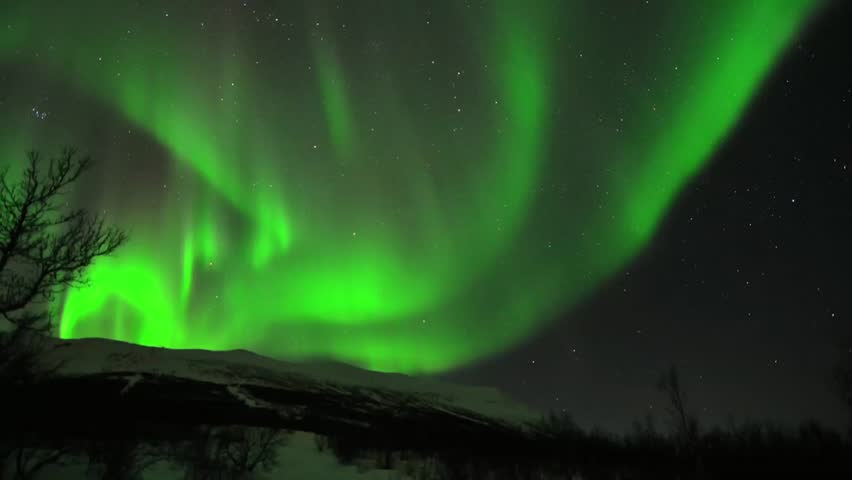 A short powerful aurora borealis dancing in the Arctic