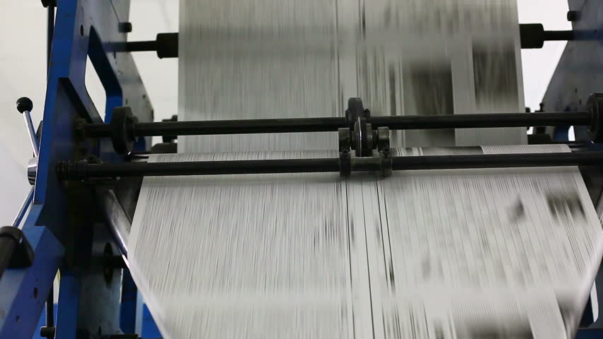 black and white newspaper production line