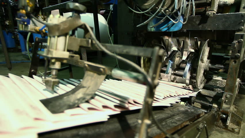 ready newspaper on production line in a print shop
