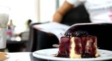 Eating blueberry cake in breaking time