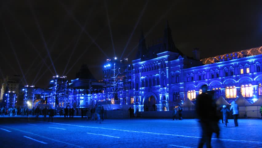 MOSCOW - OCT 21: (Timelapse View) People walk on Red Square near GUM on First international festival CIRCLE OF LIGHT, on Oct 21, 2011 in Moscow, Russia