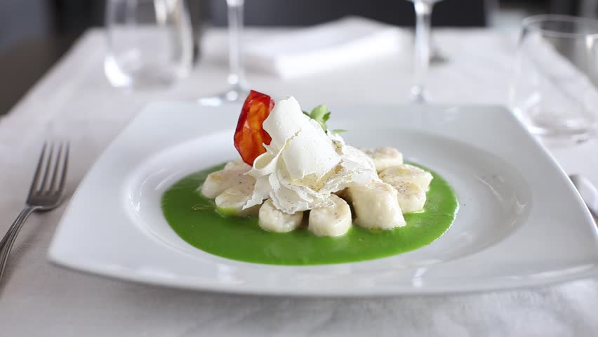 Cheese composition with green sauce. 360 rotation food
