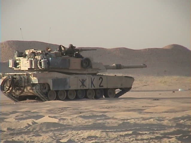 IRAQ - CIRCA 4/22/03: M1 Tanks firing their main guns.