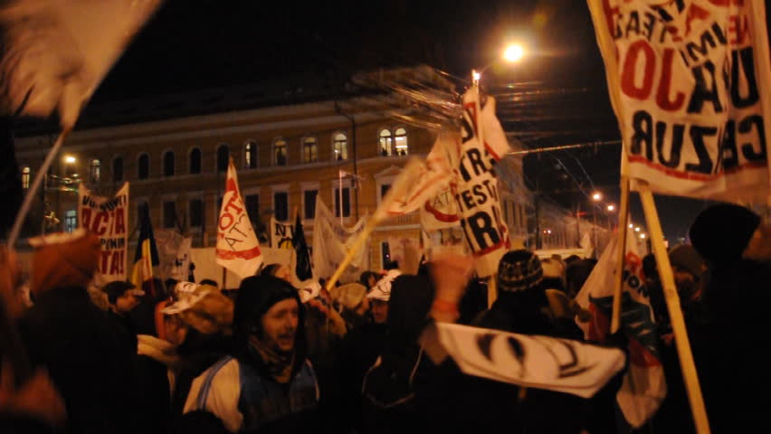 CLUJ NAPOCA - FEBRUARY 11: Hundreds of people protest against ACTA, against web piracy treaty, and against government on February 11, 2012 in Cluj Napoca, Romania.