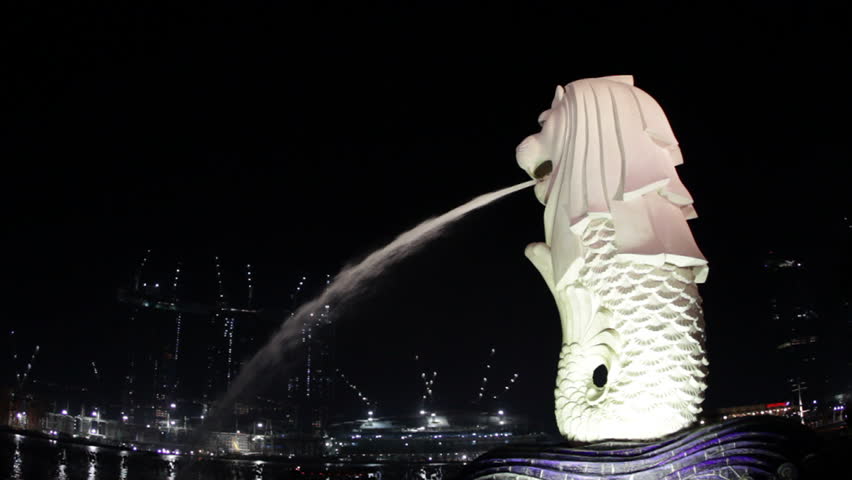 SINGAPORE - CIRCA DEC 2011: The Merlion statue of Singapore, circa December 2011. The Merlion, with a lion's head and a fish tail, was designed by Fraser Brunner as a logo of the Singapore Tourism Board.