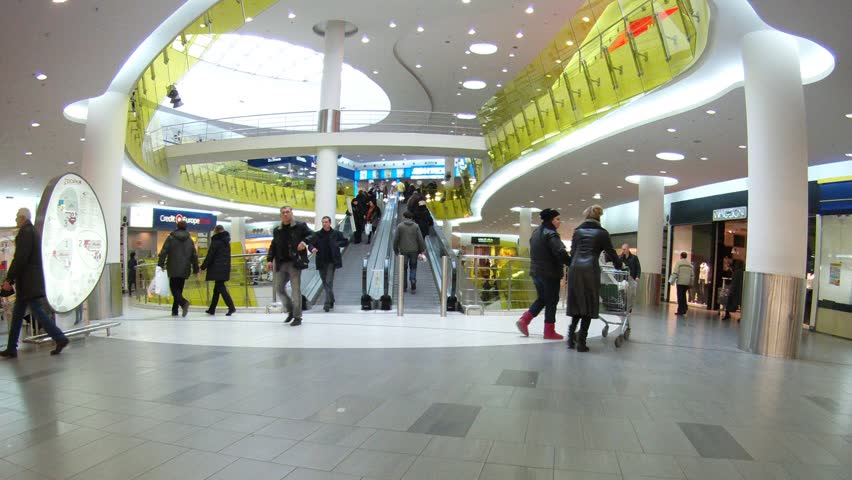 MOSCOW - DEC 21: (Timelapse View) People rise and go down on escalator  in shopping center Troika, on Dec 21, 2011 in Moscow, Russia. Russian spending in the week leading up to the big New Yearâs holiday was 16 per cent higher this year than in 2010.