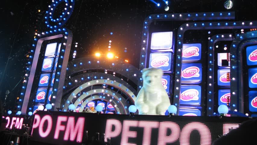 MOSCOW - DEC 17: (Timelapse View) Scene during concert shines by light on screen Aida Vedishcheva, concert of Legend RetroFM in Sports complex Olimpiyskiy, on Dec 17, 2011 in Moscow, Russia 