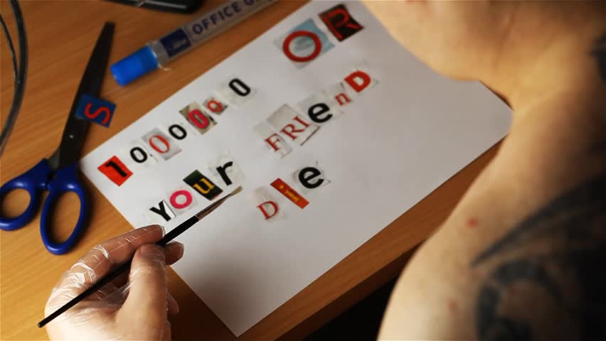 Gangster making ransom note