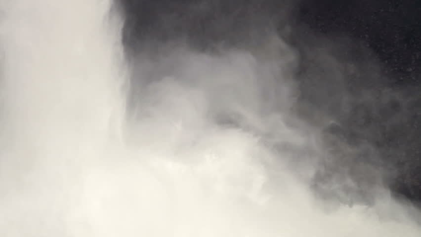 Spray at the base of the beautiful Helmcken Falls in Wells Gray Provincial Park in British Columbia, Canada