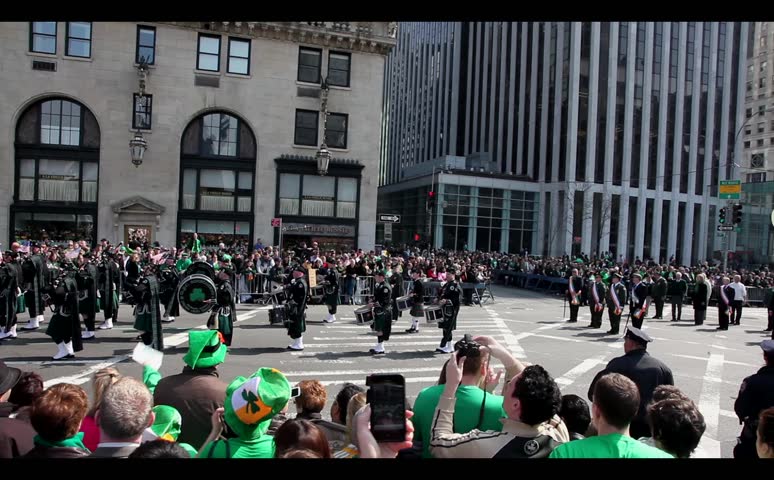 NEW YORK - MARCH 17:  People gather to watch on 59Th street as St. Patrick's Day Parade continues on 5Th Ave in New York City on March 17, 2012. (Donald Bowers)