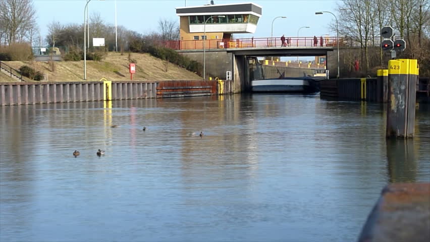 A ship leaves a canal  boat lift - time lapse.