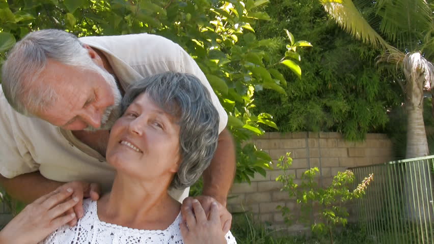 Seniors hugging