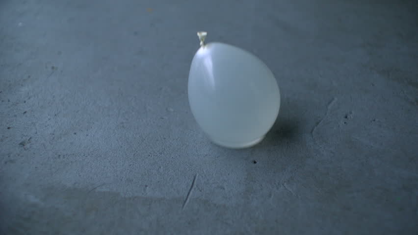 Slo-Mo Water Balloon Hitting Cement Floor