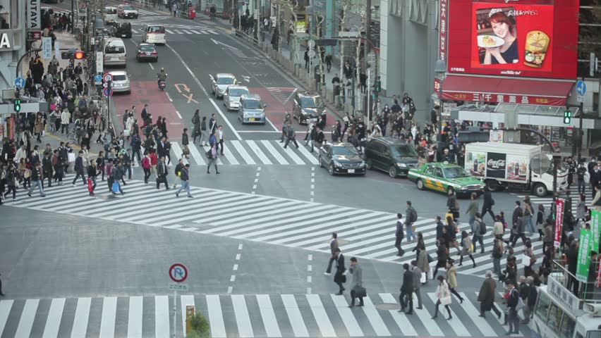TOKYO - NOVEMBER 25: People crossing street at Hachiko crossroad in Shibuya district on November 25, 2011 in Tokyo, Japan.