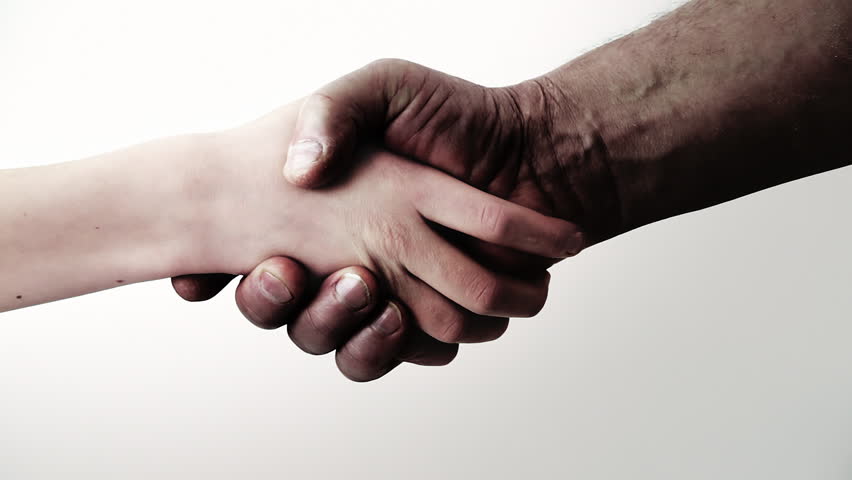 Handshake. Black and white. Reconciliation. Friendship. White Background. Connection of the generations. Removal of racial differences. 
Clip ID: handshake1_ HD