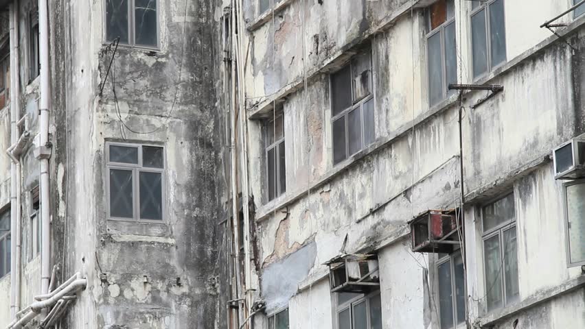 side of a chinese building in terrible condition