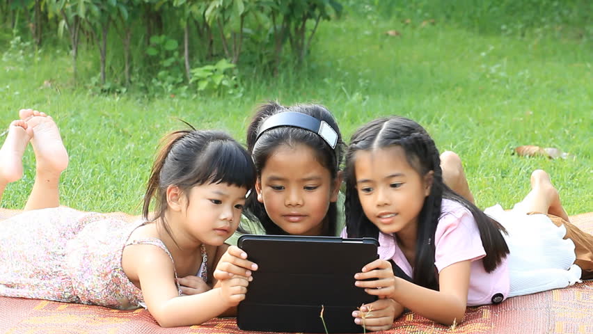 Asian girl with a small computer.