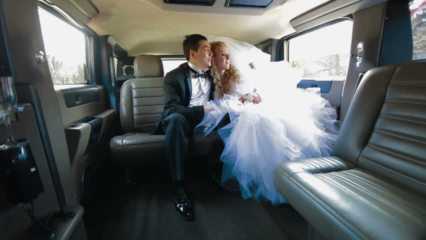 Just Married Young Couple Inside Limo