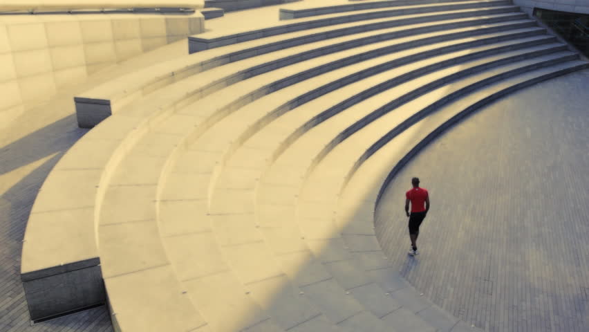 Runner on steps City hall London, UK, Slow motion, wide shot