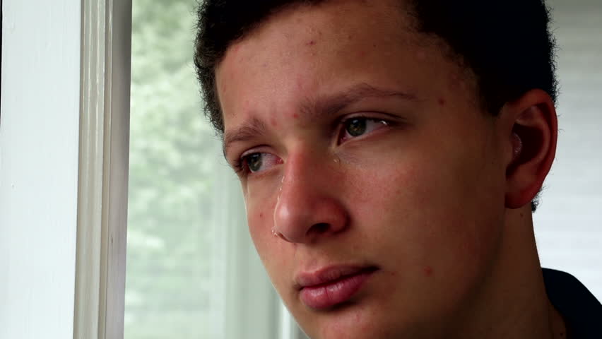 Older boy crying. 