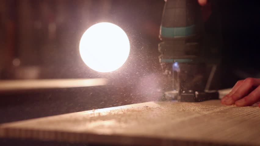 Workman in joinery workshop.