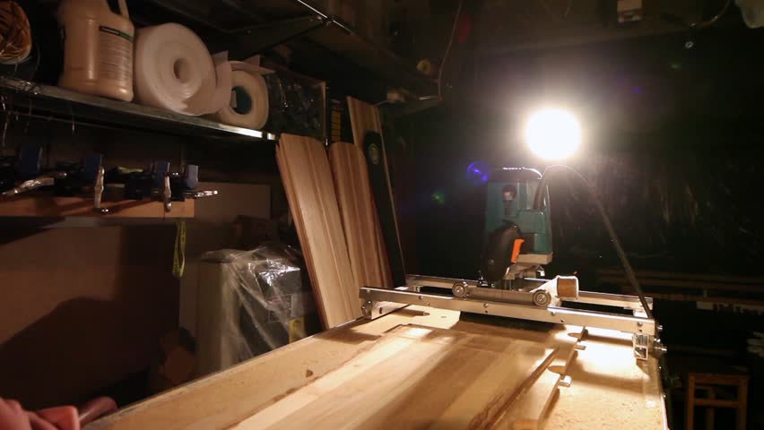 Workman in joinery workshop.