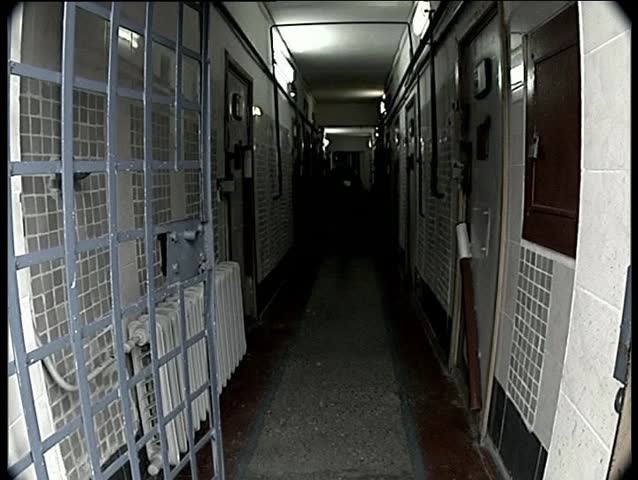 Closing prison door
