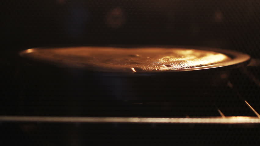 cake baked in the oven. Time Lapse