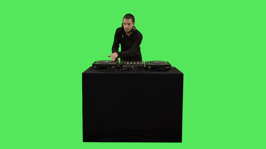 Male DJ playing music on turntable decks 