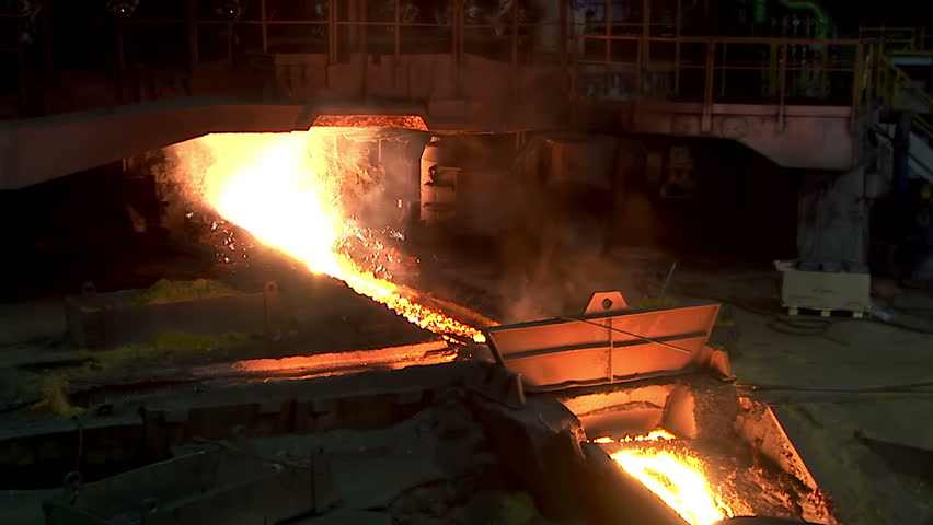 Blast furnace. Smelting iron. A river of molten metal.