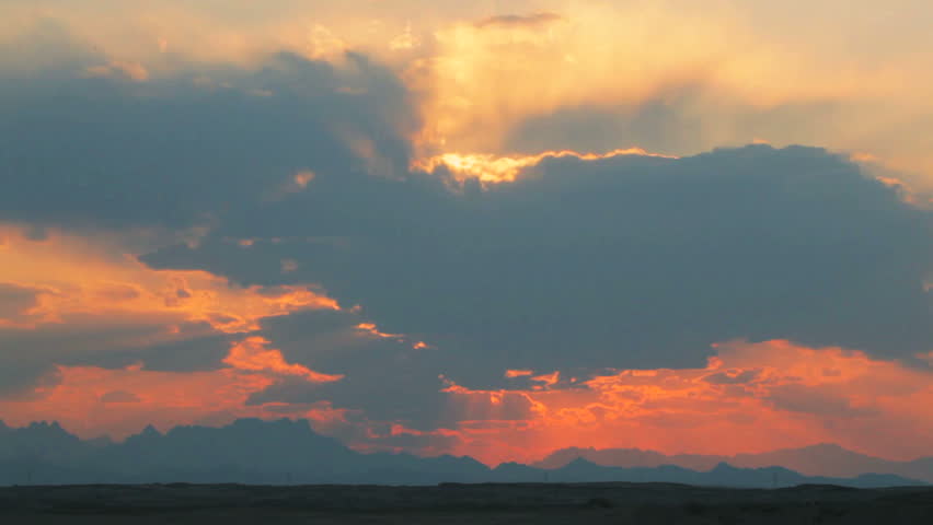 timelapse sunset in orange sky
