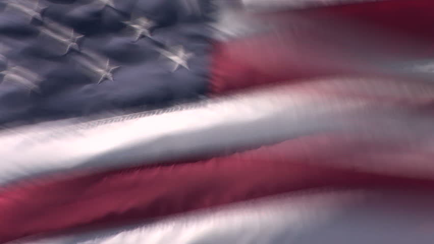 The American flag waving patriotically in the breeze, full frame, close up.       Format: NTSC HDV Compression: MotionJPEG-A Camera: Sony HVR-Z1U Size: 1080i (1920 x 1080) Sound: No