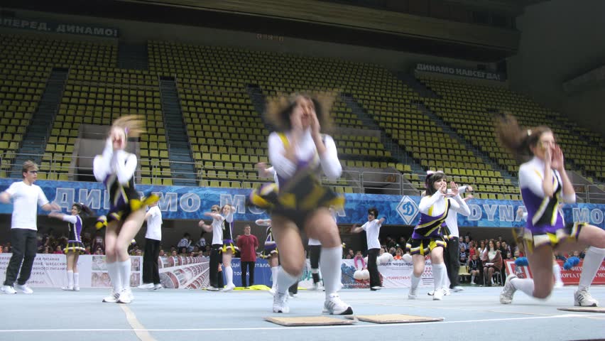 MOSCOW - MAR 24: (Timelapse View) Action team participates in Annual competitions of Championship of Moscow on cheerleading in Dynamo sports palace, on March 24, 2012 in Moscow, Russia