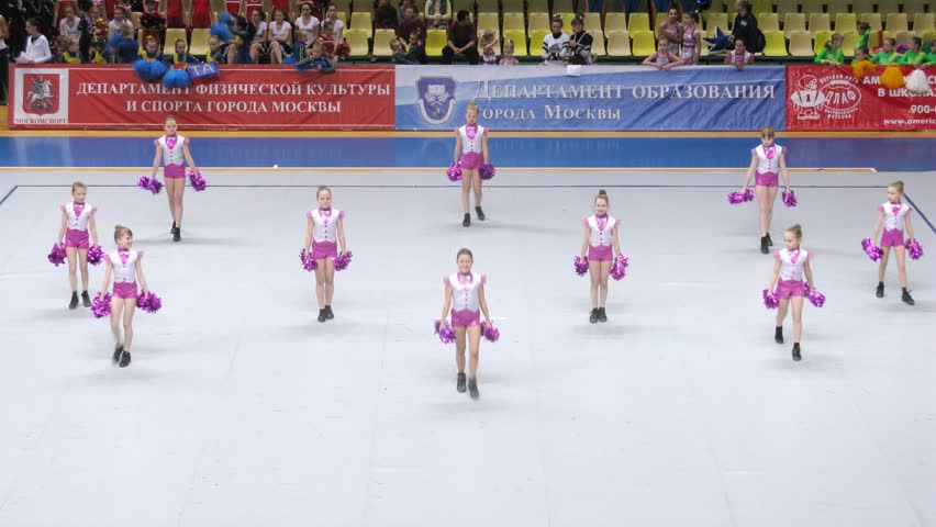 MOSCOW - MAR 24: (Timelapse View) Barbie team participates in Annual competitions of Championship of Moscow on cheerleading in Dynamo sports palace, on March 24, 2012 in Moscow, Russia