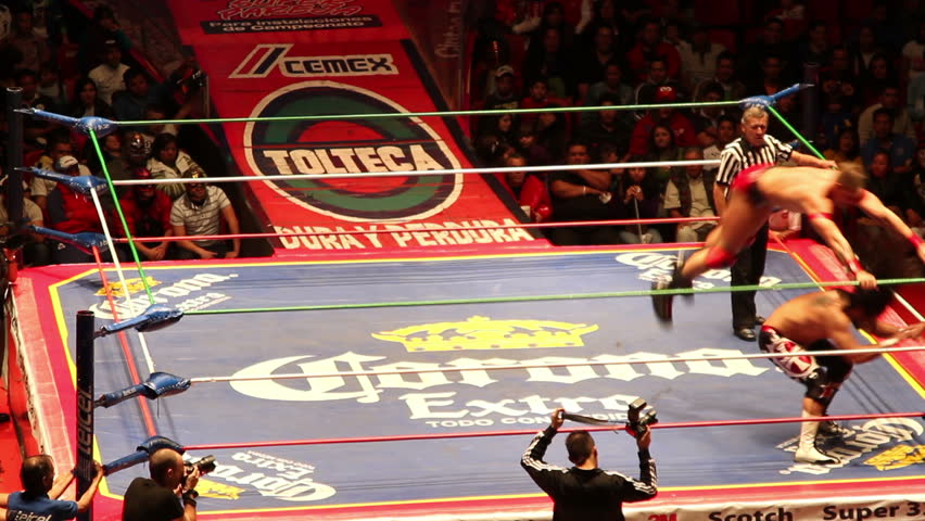 MEXICO CITY - DECEMBER 19: Ringside view of a lucha libre, famous mexican wrestling competition at Arena Mexico on DECEMBER 19, 2011 in Mexico City, Mexico. 

