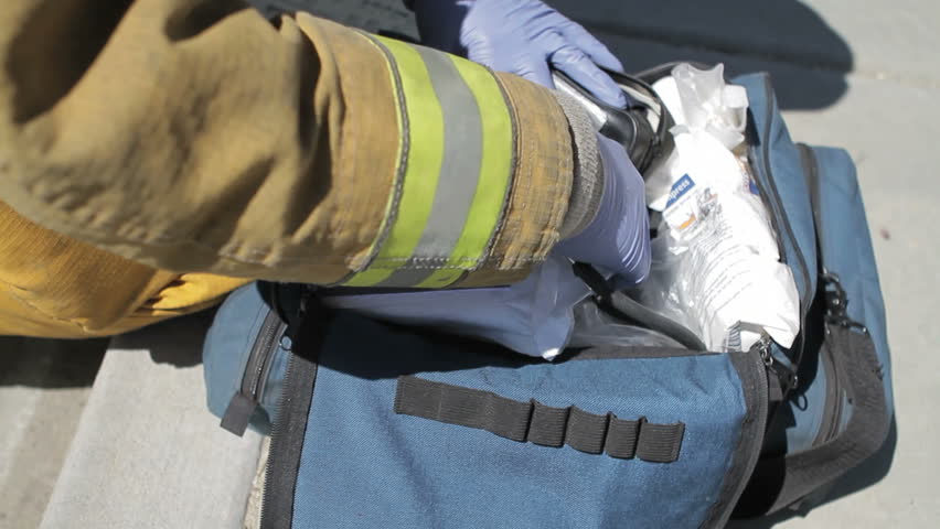 EMT checking on emergency supplies 