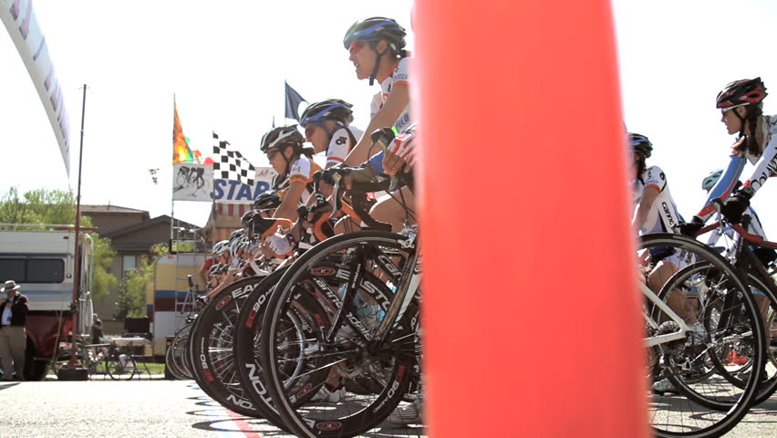 California - Circa 2009: A bike race in 2009. Bike racers lined up at the start line in California.