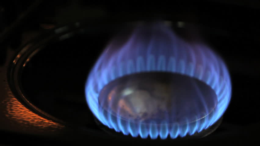 Stove top natural gas burner turning on and off