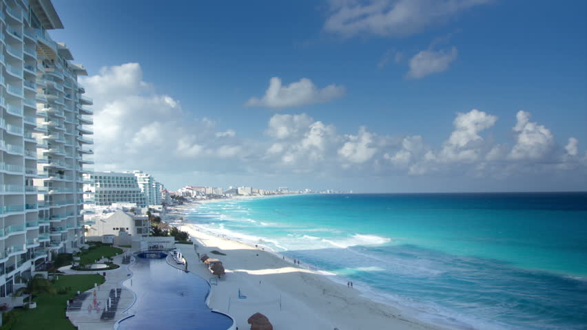timelapse of the bay of hotels stretching along the coast in cancun, mexico