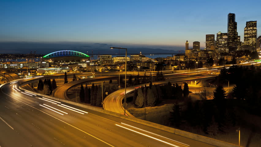Timelapse of Interstate Traffic during sunset with Seattle Skyline in the background