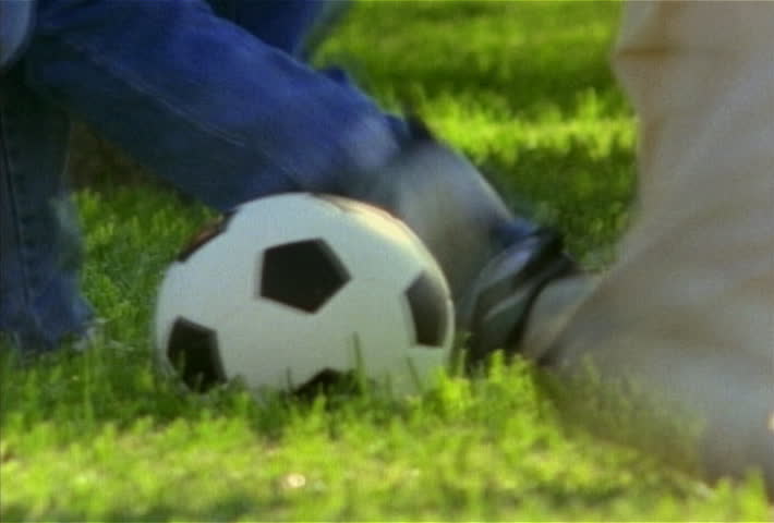 1990s Family playing soccer